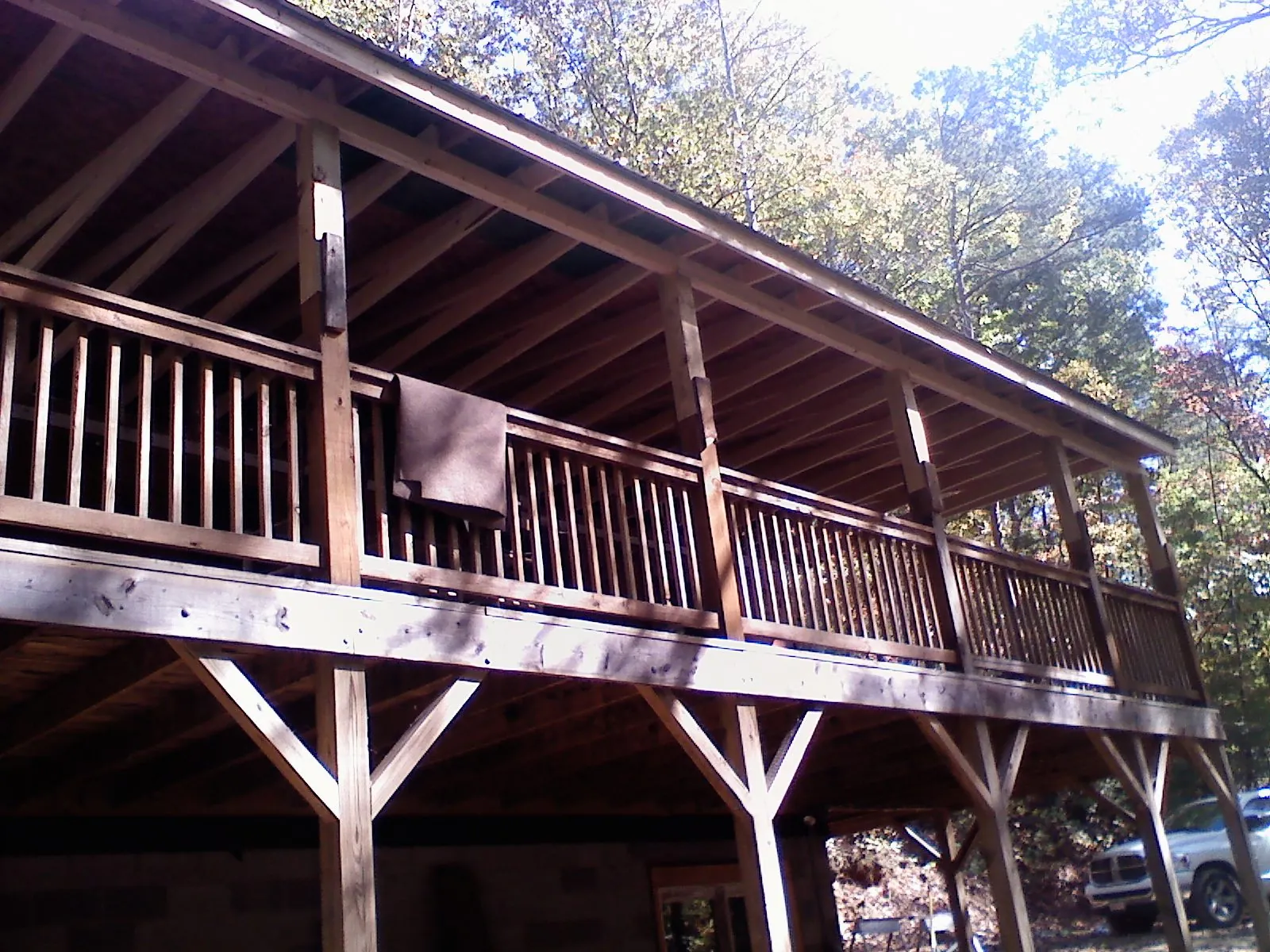 Timber framing under a new elevated porch and deck — Roof Leak Repair in Paige by Roofing Brothers